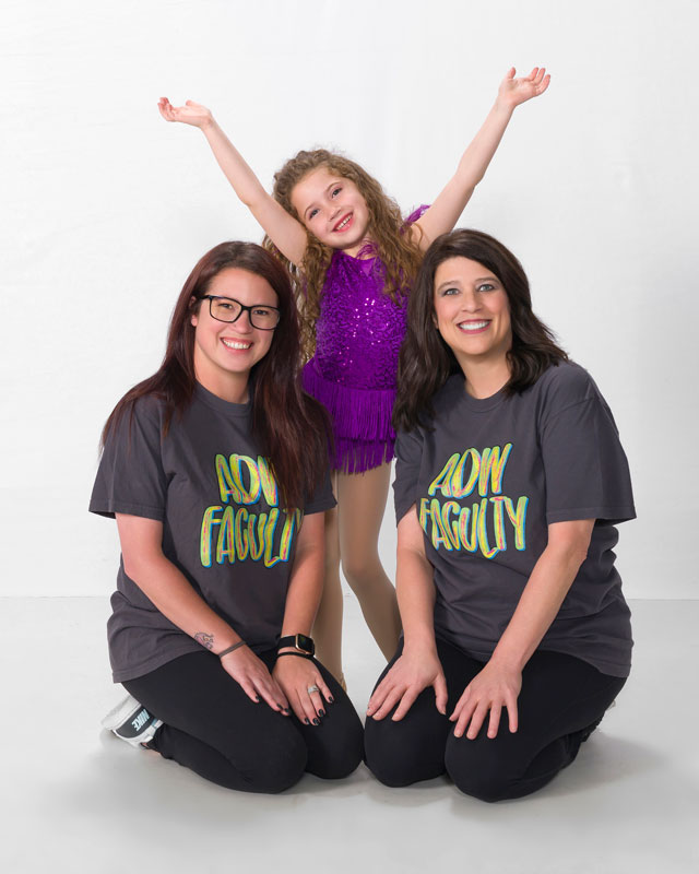 student dancer with instructors
